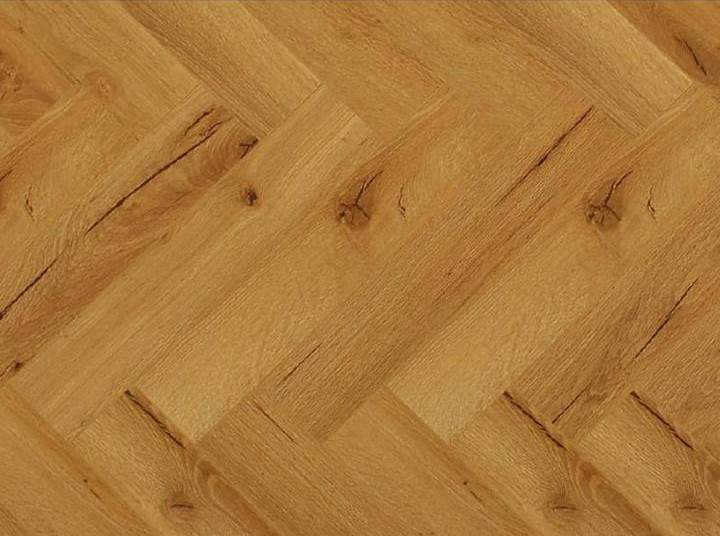 Herringbone 2.0 — golden oak herringbone floor close-up