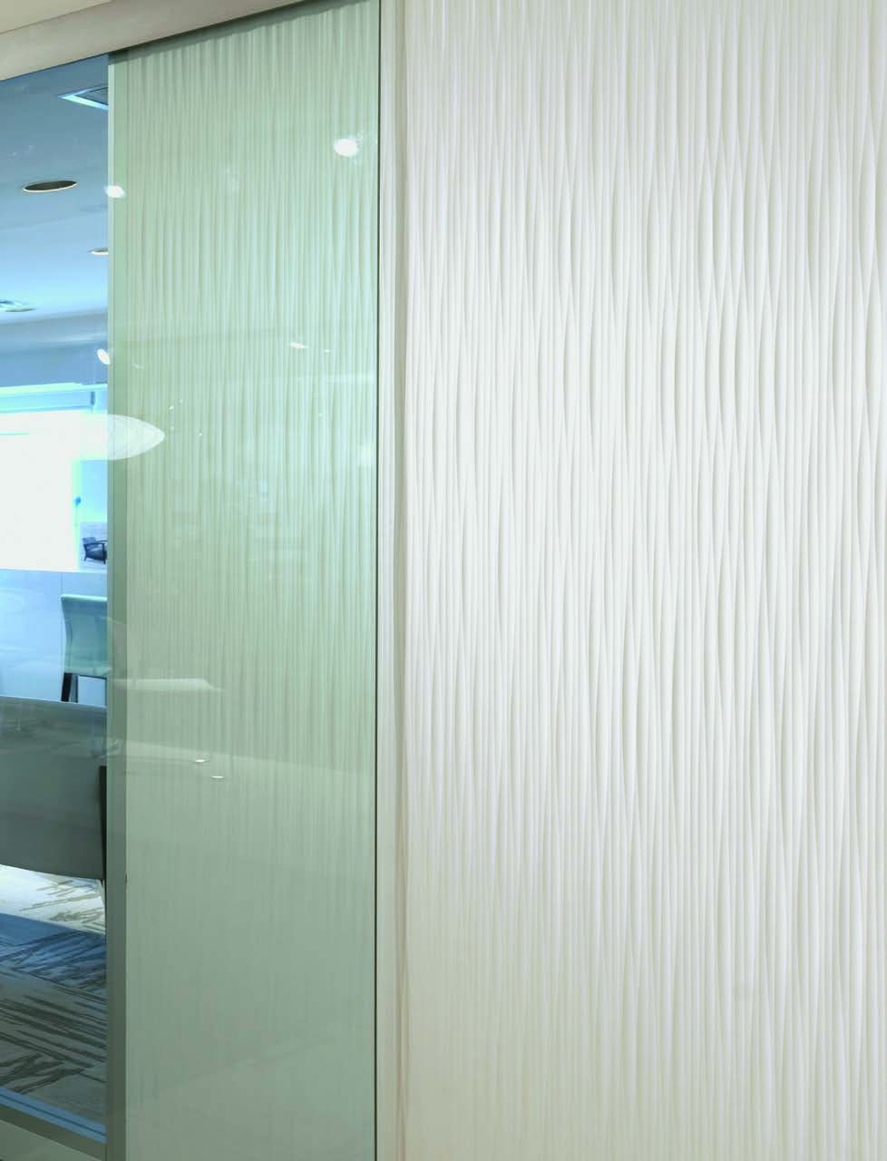 Bonded Quartz panels in white with a sculpted wave relief