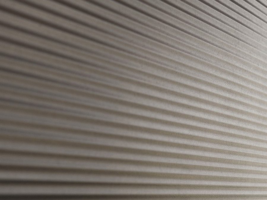 Fused metal sheet with a rippled silver finish
